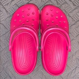 Bright pink crocs!